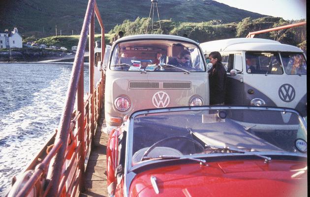 Vintage camper-vans crossing on a ferry